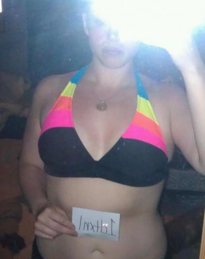 A picture of a 5'8" female showing a snapshot of 182 pounds at a height of 5'8