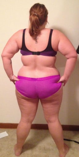 A photo of a 5'3" woman showing a weight loss from 235 pounds to 208 pounds. A respectable loss of 27 pounds.