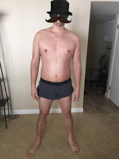 A picture of a 6'1" male showing a snapshot of 210 pounds at a height of 6'1