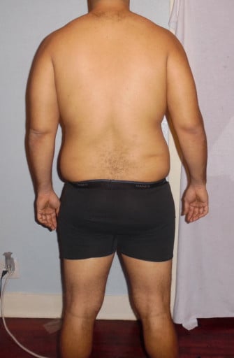 A photo of a 6'2" man showing a snapshot of 245 pounds at a height of 6'2