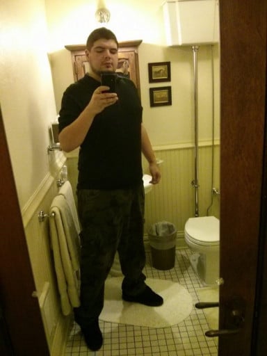 A photo of a 6'2" man showing a weight loss from 309 pounds to 192 pounds. A total loss of 117 pounds.