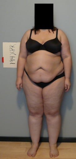 A picture of a 5'3" female showing a snapshot of 244 pounds at a height of 5'3
