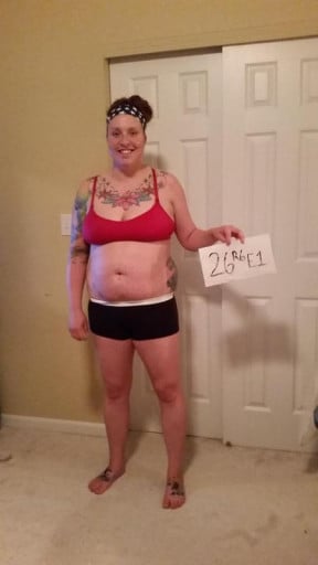 A progress pic of a 5'9" woman showing a snapshot of 192 pounds at a height of 5'9