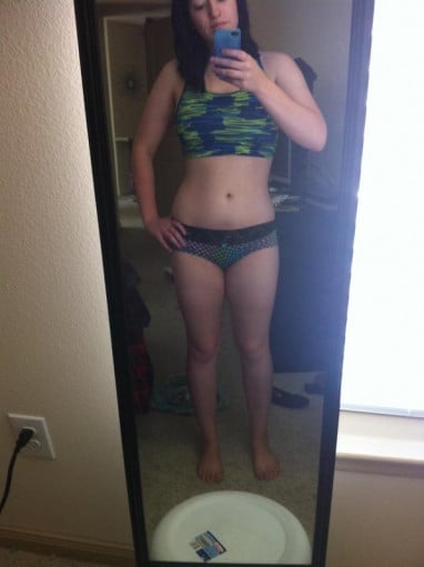 A photo of a 5'3" woman showing a weight reduction from 167 pounds to 125 pounds. A net loss of 42 pounds.