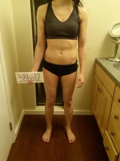 A progress pic of a 5'4" woman showing a snapshot of 117 pounds at a height of 5'4