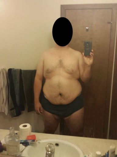 A picture of a 6'3" male showing a snapshot of 323 pounds at a height of 6'3