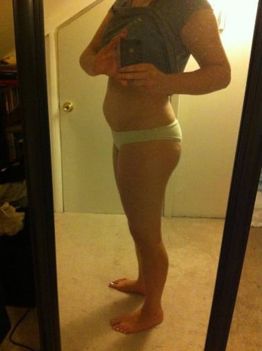 A photo of a 5'5" woman showing a weight loss from 160 pounds to 153 pounds. A total loss of 7 pounds.
