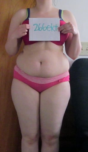 A photo of a 5'7" woman showing a snapshot of 206 pounds at a height of 5'7