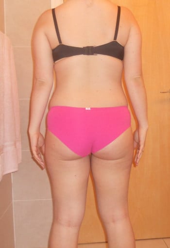 A progress pic of a 5'5" woman showing a snapshot of 164 pounds at a height of 5'5