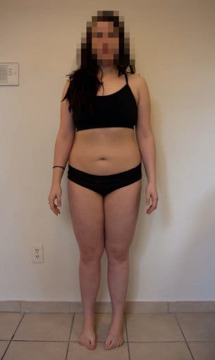 A progress pic of a 5'6" woman showing a snapshot of 165 pounds at a height of 5'6