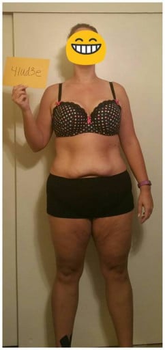 A photo of a 5'10" woman showing a snapshot of 228 pounds at a height of 5'10