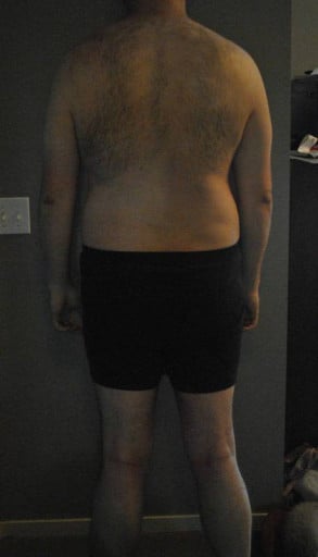 A photo of a 6'4" man showing a fat loss from 275 pounds to 200 pounds. A total loss of 75 pounds.
