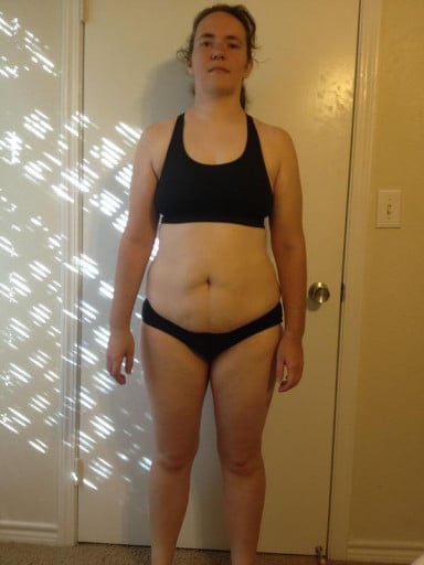 A progress pic of a 5'7" woman showing a snapshot of 181 pounds at a height of 5'7