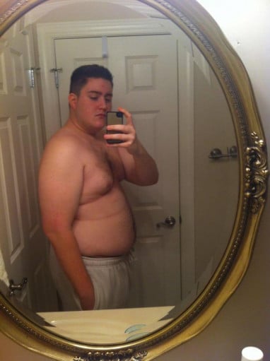 A photo of a 6'1" man showing a weight cut from 315 pounds to 210 pounds. A total loss of 105 pounds.