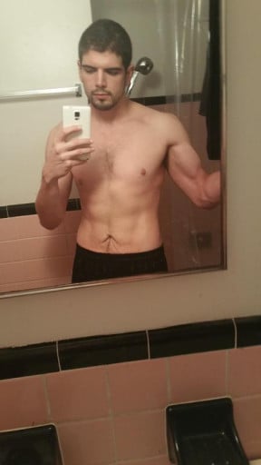 A picture of a 6'2" male showing a weight reduction from 309 pounds to 180 pounds. A total loss of 129 pounds.