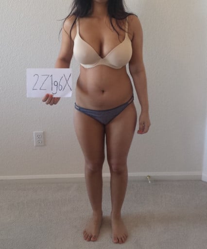 A photo of a 5'2" woman showing a snapshot of 117 pounds at a height of 5'2