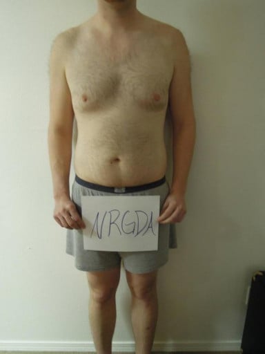 A photo of a 6'3" man showing a snapshot of 215 pounds at a height of 6'3