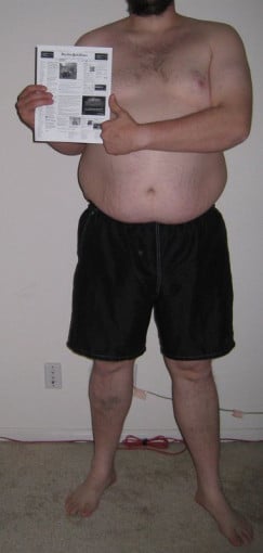 A photo of a 6'5" man showing a snapshot of 322 pounds at a height of 6'5