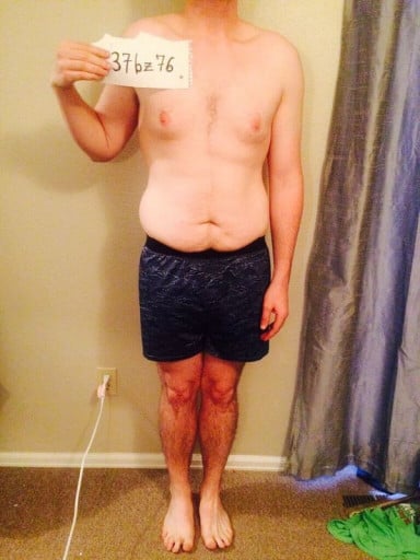 A photo of a 5'11" man showing a snapshot of 185 pounds at a height of 5'11