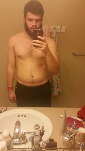 A photo of a 5'9" man showing a weight reduction from 210 pounds to 177 pounds. A total loss of 33 pounds.