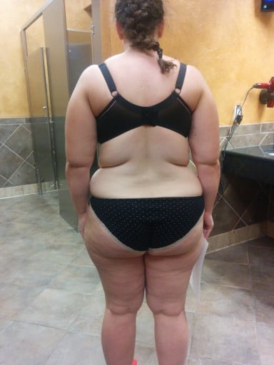 A progress pic of a 5'3" woman showing a snapshot of 221 pounds at a height of 5'3