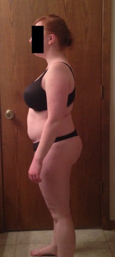 A progress pic of a 5'0" woman showing a snapshot of 154 pounds at a height of 5'0