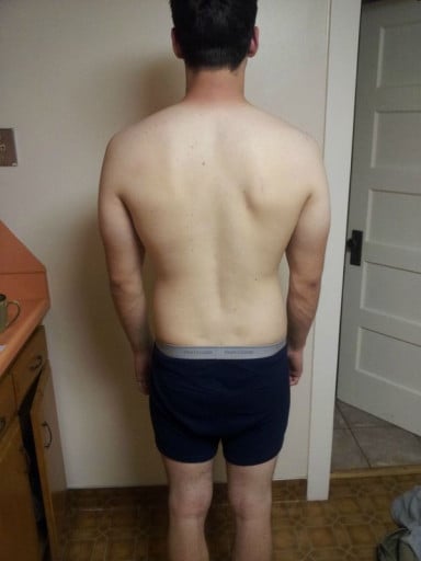 A progress pic of a 5'11" man showing a snapshot of 176 pounds at a height of 5'11