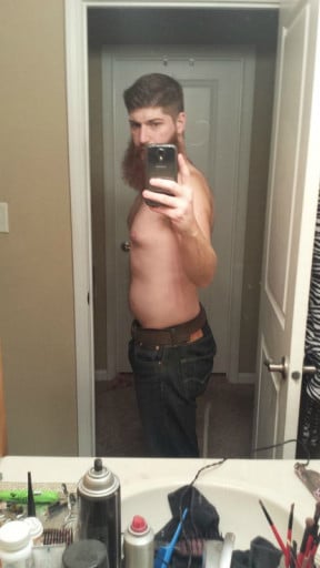 A before and after photo of a 5'10" male showing a weight cut from 265 pounds to 180 pounds. A net loss of 85 pounds.
