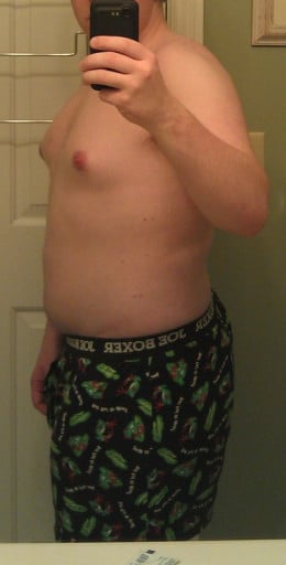 A picture of a 5'9" male showing a snapshot of 199 pounds at a height of 5'9