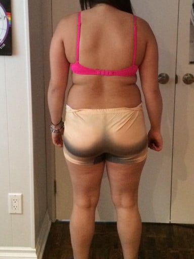 A progress pic of a 5'5" woman showing a snapshot of 163 pounds at a height of 5'5
