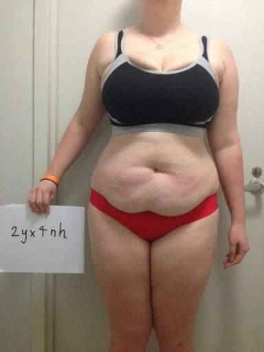 A progress pic of a 5'8" woman showing a snapshot of 197 pounds at a height of 5'8