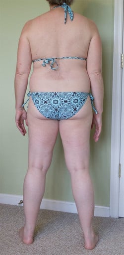 A progress pic of a 5'2" woman showing a snapshot of 147 pounds at a height of 5'2