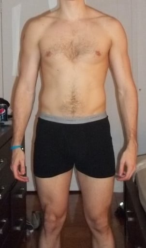 A progress pic of a 6'2" man showing a snapshot of 194 pounds at a height of 6'2