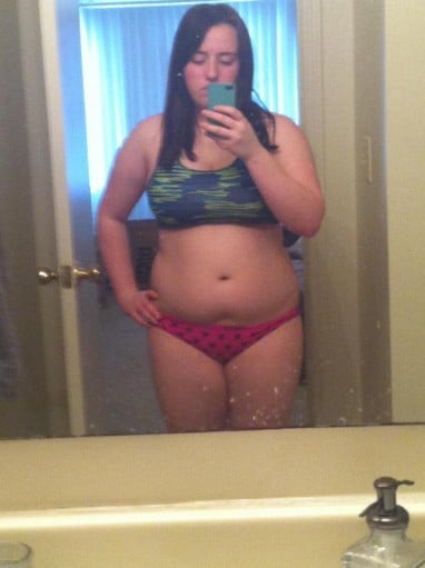 A photo of a 5'3" woman showing a weight reduction from 167 pounds to 125 pounds. A net loss of 42 pounds.
