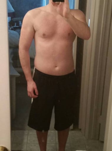 A photo of a 5'9" man showing a snapshot of 157 pounds at a height of 5'9