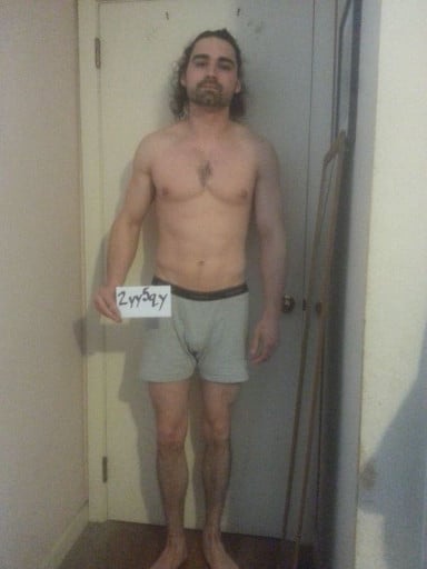 A photo of a 5'9" man showing a snapshot of 163 pounds at a height of 5'9