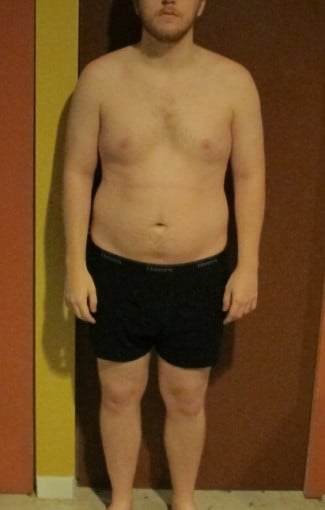 A photo of a 5'11" man showing a snapshot of 205 pounds at a height of 5'11
