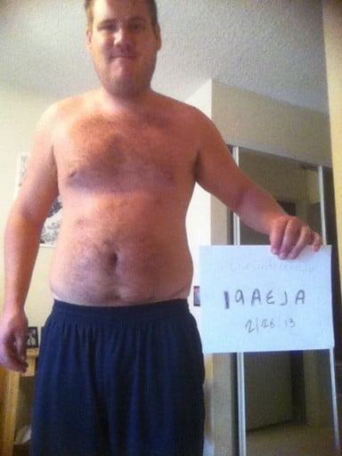 A photo of a 6'11" man showing a snapshot of 209 pounds at a height of 6'11
