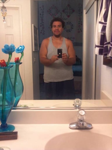A photo of a 6'2" man showing a fat loss from 355 pounds to 275 pounds. A net loss of 80 pounds.