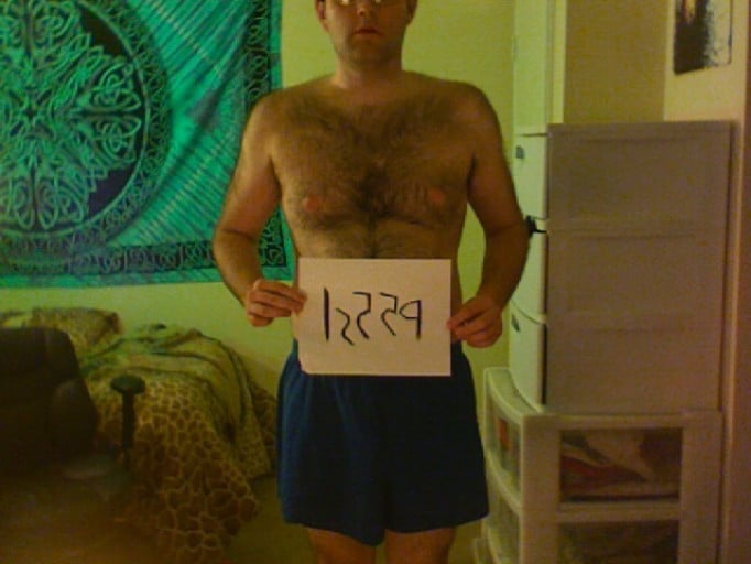 A photo of a 5'11" man showing a snapshot of 222 pounds at a height of 5'11