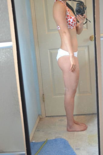 A progress pic of a 5'2" woman showing a snapshot of 117 pounds at a height of 5'2