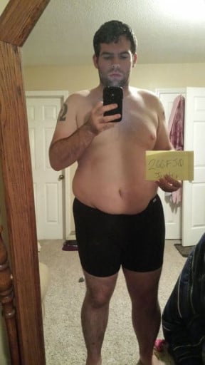 A progress pic of a person at 281 lbs