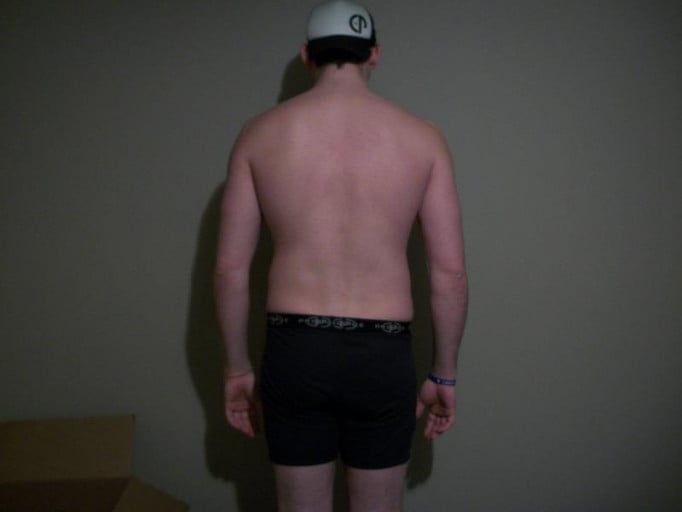 A progress pic of a 6'5" man showing a snapshot of 215 pounds at a height of 6'5