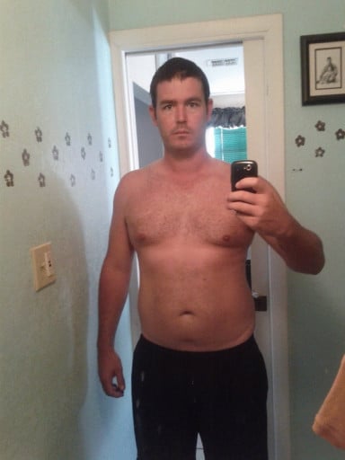 A progress pic of a 6'3" man showing a weight cut from 265 pounds to 215 pounds. A total loss of 50 pounds.