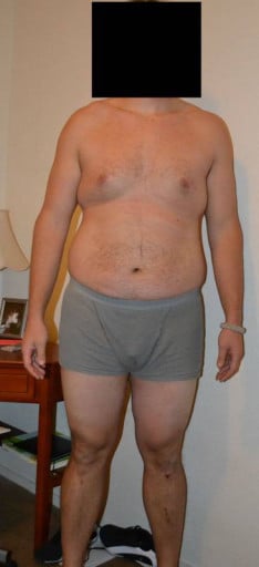 A progress pic of a 6'6" man showing a snapshot of 287 pounds at a height of 6'6