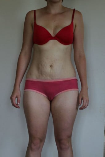 A photo of a 5'3" woman showing a snapshot of 119 pounds at a height of 5'3