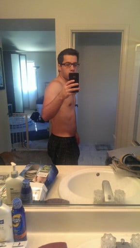 A picture of a 5'6" male showing a weight cut from 215 pounds to 150 pounds. A total loss of 65 pounds.