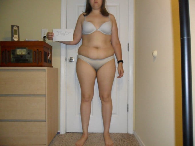 A progress pic of a 5'7" woman showing a snapshot of 180 pounds at a height of 5'7