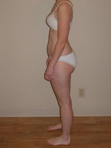 A picture of a 5'2" female showing a snapshot of 114 pounds at a height of 5'2