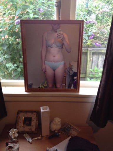 A progress pic of a 5'5" woman showing a fat loss from 163 pounds to 123 pounds. A net loss of 40 pounds.